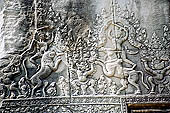 Angkor Wat temple, the fourth enclosure, the bas reliefs of the west gopura, friezes of figurines mounted on a variety of animals 